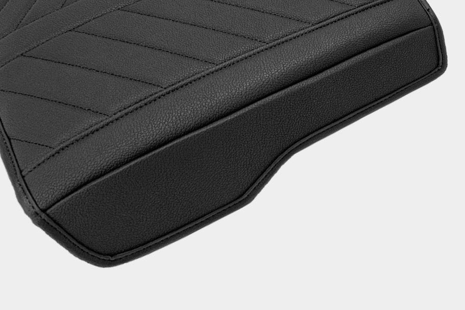 Armrest latch
